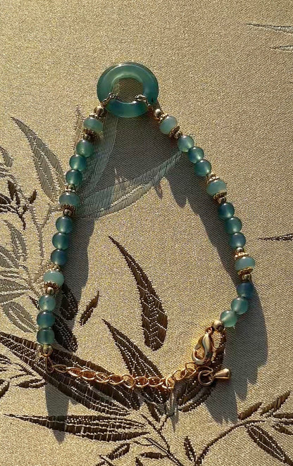 Natural Blue Water Jadeite Beaded Bracelet with Peace Buckle